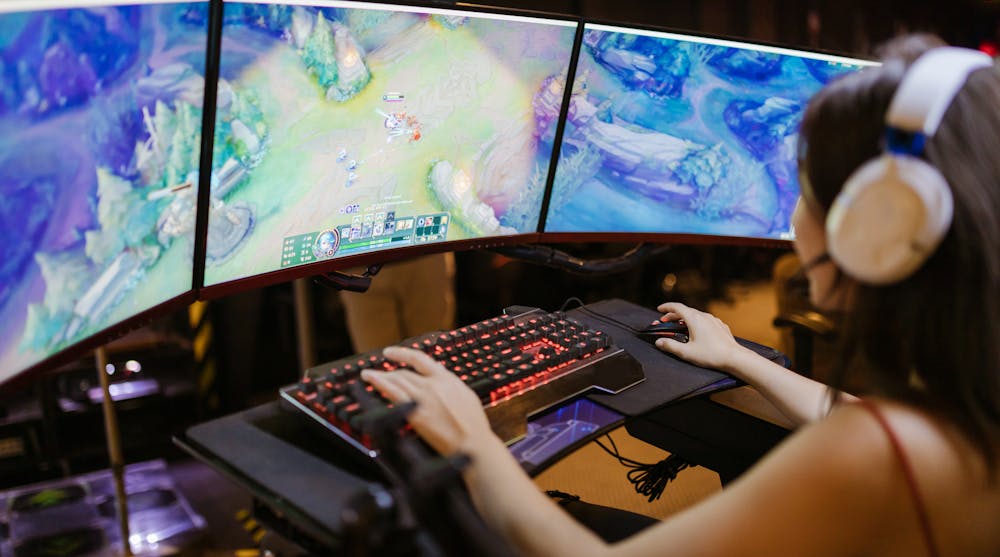 A woman playing League of Legends